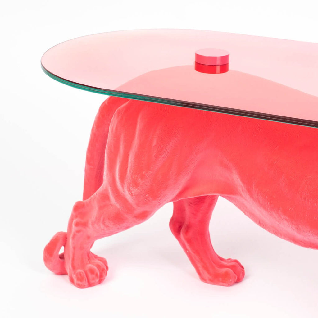 Figurine Glass Top Coffee Table