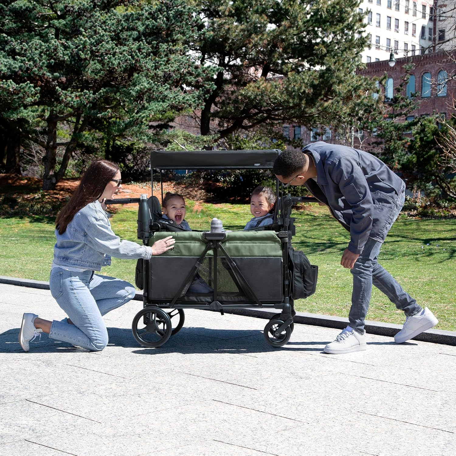 Delta Children - Jeep Wrangler Deluxe 4 Seater Stroller Wagon - Premium Quad Stroller Wagon for 4 Kids with Convertible Seats, Adjustable Push/Pull Handles, Removable Canopy & Flat Fold, Black/Green