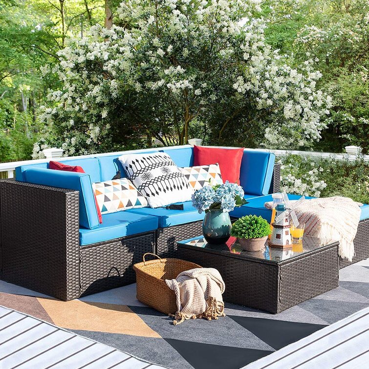 Huang 4 - Person Outdoor Seating Group with Cushions